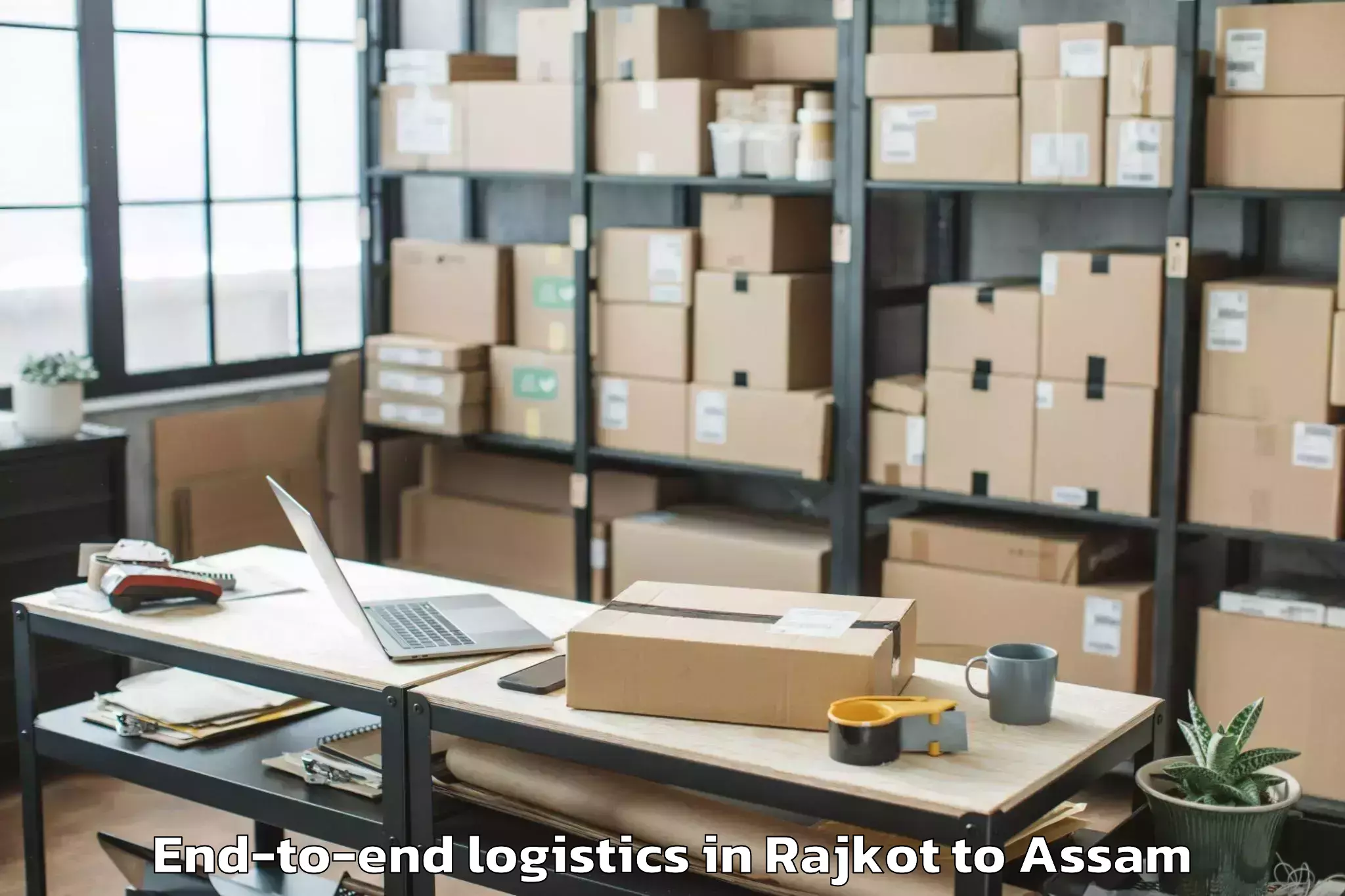 Professional Rajkot to Kokrajhar Pt End To End Logistics